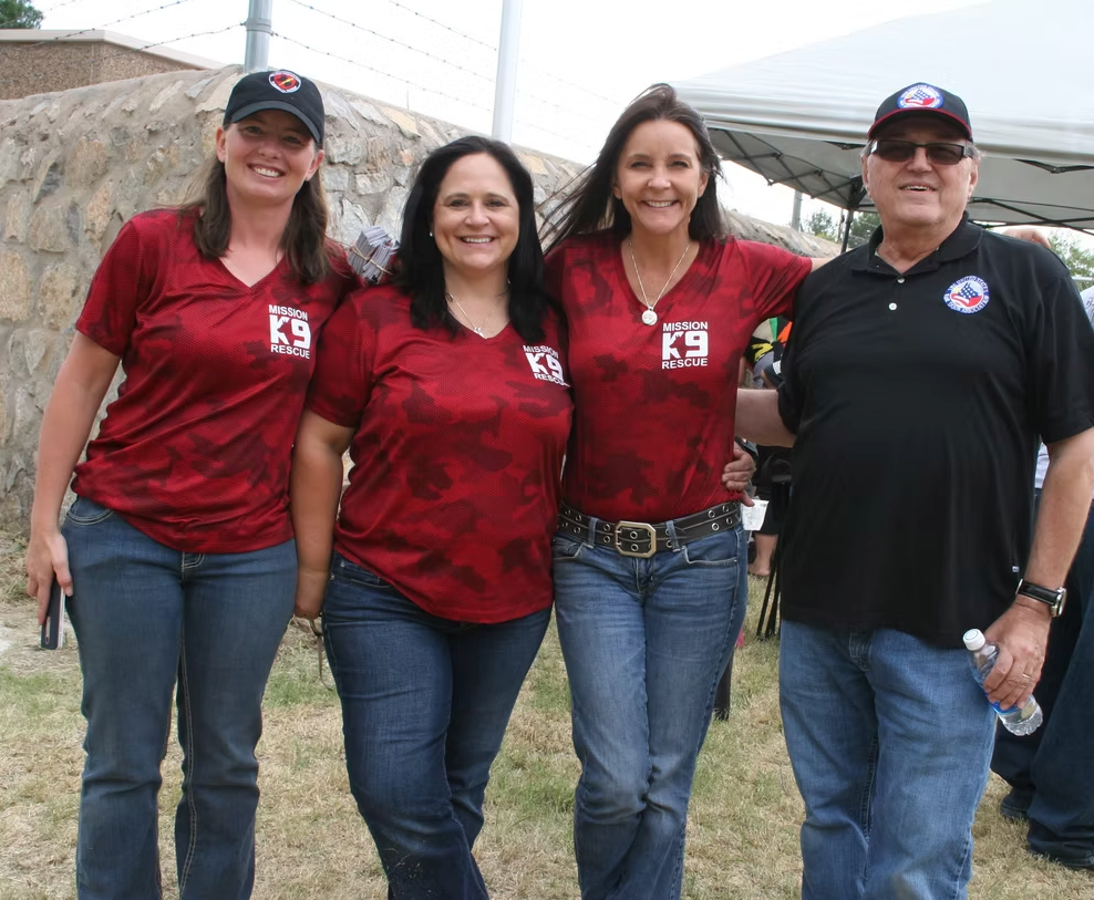 Volunteers in team shirts at a Project Always Beside You event